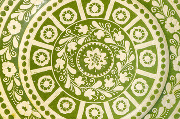 close up of  ornamental ceramic plate background