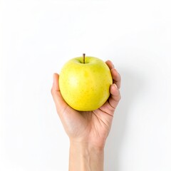 Hand Holding a Fresh Golden Delicious Apple on White Background.