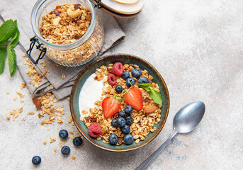 Healthy breakfast granola bowl with fresh berries
