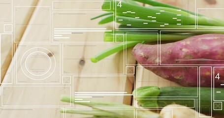 Showing scallions, sweet potato, zucchini, ginger and okra overlaying UI on wood table, copy space © vectorfusionart