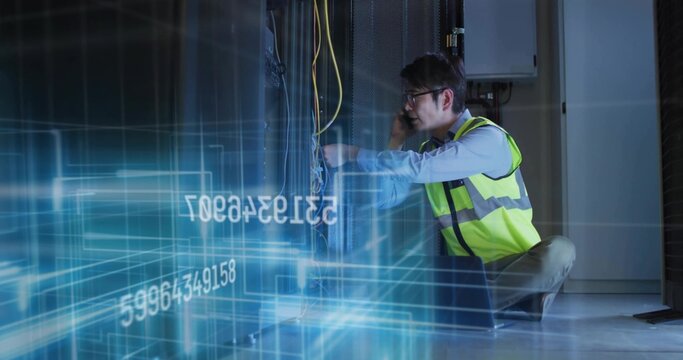 Technician kneeling in server room holding phone adjusting Ethernet cables with overlay, copy space
