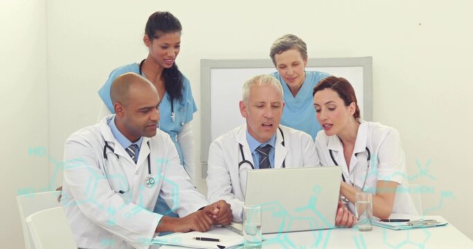 Collaborating team analyzing patient data in hospital room, with laptop and molecular overlays