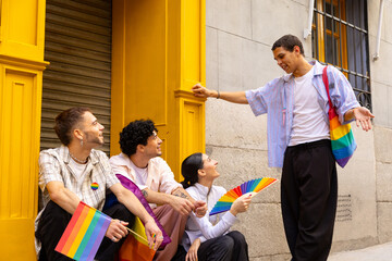 Diverse friends talking during pride celebration event