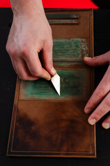 Blade sharpening ensures smooth cuts and high-quality results in traditional craftsmanship. Knife preparation starts with sharpening. Knife sharpening for leatherwork.