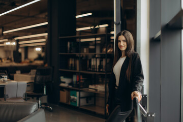 Confident Professional Woman in Modern Stylish Office Setting