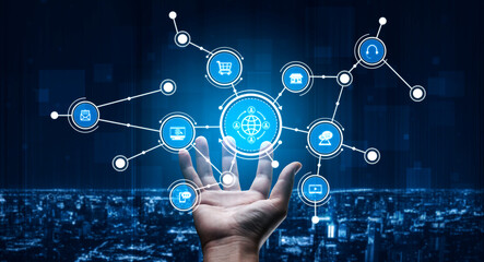 A hand reaches out to interact with floating digital icons, representing technology and...