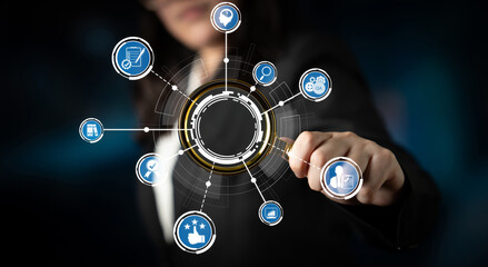 A business professional interacts with digital technology icons, highlighting themes of innovation...