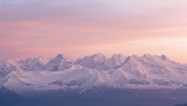 Revealing snowy mountain range in alpine region glowing under pastel sunrise, with drifting mist - Powered by Adobe