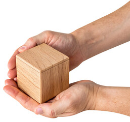 a wooden square cube is in an isolated hand