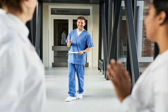 Diverse medical professionals collaborating in a modern healthcare environment