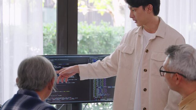 senior programmer bootcamlp,Asian young instructor guides senior learners through a programming on whiteboard, highlighting algorithm thinking and simple code exercises