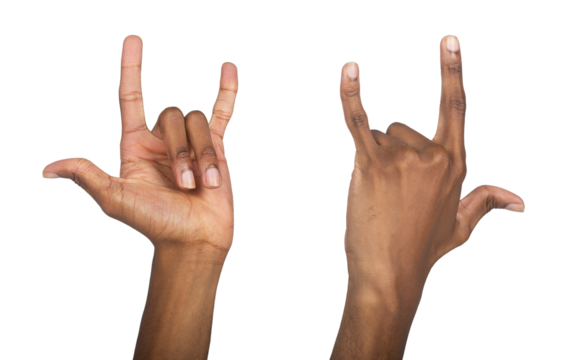 Rock hand gesture, African American man raising fingers in the classic metal horn sign. Symbol of