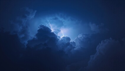 Cumulonimbus cluster glowing in high-altitude night storm sky, with forked lightning illumination