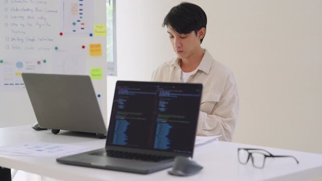 Developer software programmer computer coding screen working technology engineering monitor at modern workspace