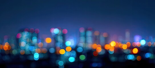 Out-of-focus cityscape at night, lights blurred into colorful orbs