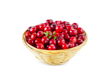 Cranberries in a wicker basket isolated on a white background.