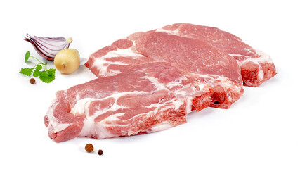 Kotlety karkowe z ziołami i czosnkiem na białym tle