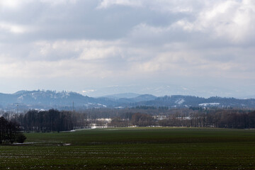 Sudeten Mountains with snow in Poland in spring. Mountain landscape