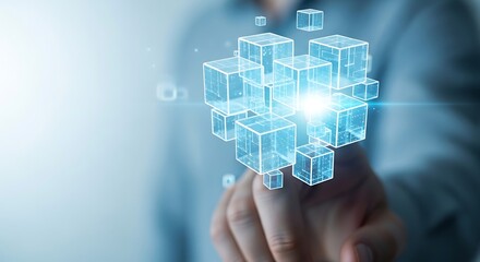 Hand reaching out to touch a cluster of glowing transparent cubes representing data or digital structure