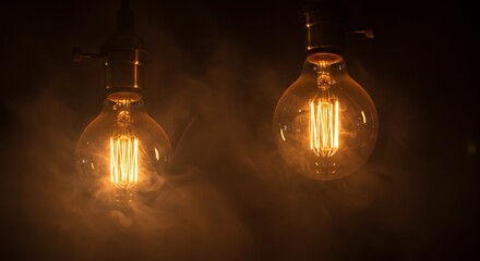 Two glowing vintage Edison light bulbs illuminate a dark, smoky room with warm, inviting light.