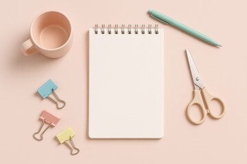 Minimal workspace with pastel color palette, modern stationery and blank notepad for message

