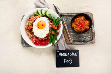 ndonesian nasi goreng (fried rice) served on a plate.