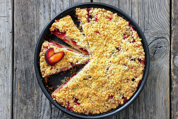 Crumb topped Plum Pie in a baking dish