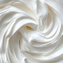 Obraz premium Cream swirls in soft texture, perfect for dessert decoration or culinary art