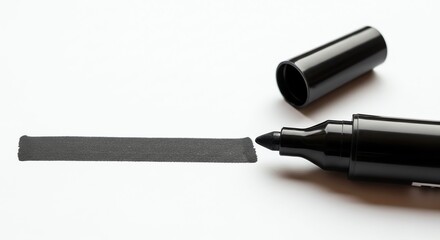 Black Marker Pen Writing on White Surface with Cap Removed