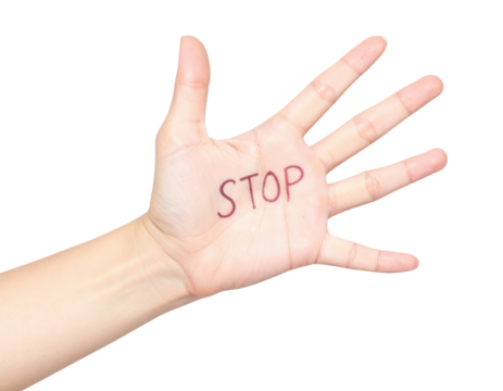 A hand with "STOP" written on the palm, symbolizing a clear message or demand for pause or caution.