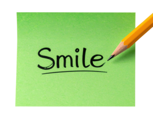 A green sticky note with the word "Smile" written in bold black letters, accompanied by a sharpened yellow pencil.