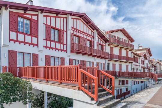 Traditional Neo-Basque waterfront Houses with Footbridges, Saint-Jean-de-Luz, French Basque Coast - Powered by Adobe