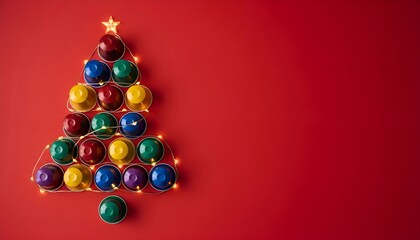 close-up of Christmas tree made from colorful coffee capsules decorated with multicolored string lights on matte background. Christmas promotion