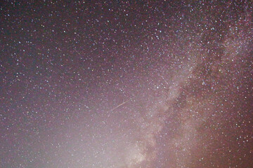 The majestic Milky Way galaxy stretches across the dark night sky.