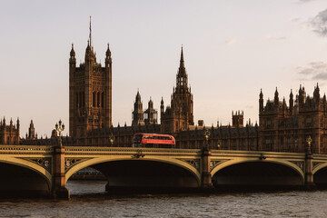 Naklejka premium Big Ben and Westminster Bridge over River Thames at dusk