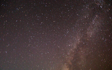 The majestic Milky Way galaxy stretches across the dark night sky.