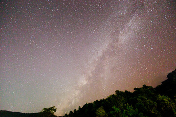 The majestic Milky Way galaxy stretches across the dark night sky.