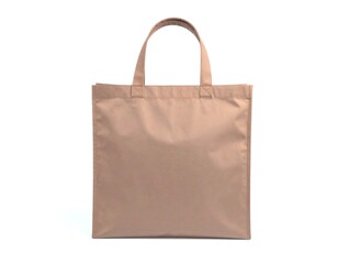 Beige tote bag isolated on white clean background
