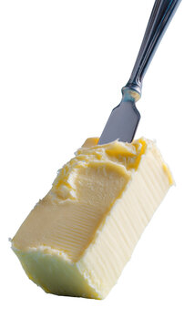 Butter Knife: A close-up shot captures the simple elegance of butter being expertly cut with a knife.