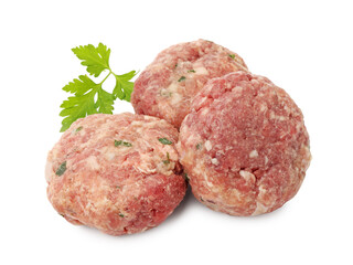 Fresh raw meat patties and parsley isolated on white