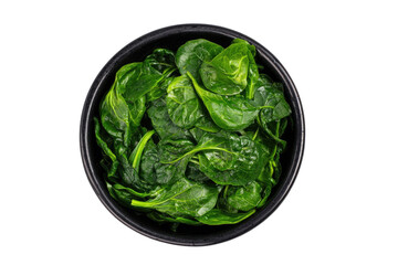 Bowl full of vibrant, fresh, green spinach against black