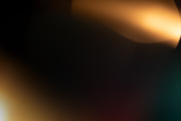 abstract light background,light leak overlay effect with scratch dust and motion blur light leaks,retro noisy film texture light leak flare on black background,abstract background with ray