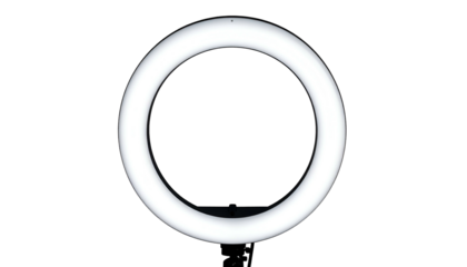 Bright ring light illuminates subject for professional photography and videography.