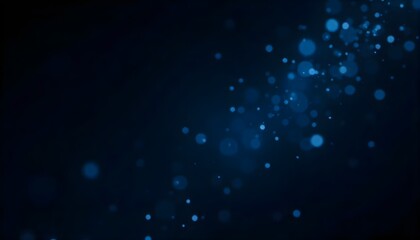 Abstract blue bokeh lights shimmering on dark background