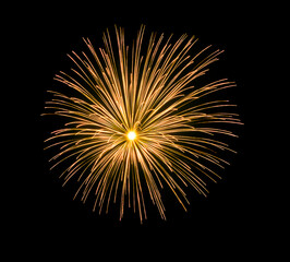 Golden firework sparkling on black background for celebration and anniversary
