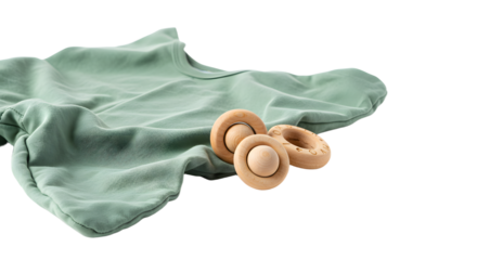 BABY TOYS - Soft green baby blanket with wooden teething rings on a white background, ideal for newborn photography and baby care themes