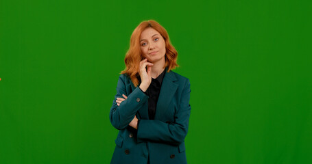 Annoyed woman listening to someone waiting impatiently showing disapproval isolated on green screen background. Unimportant conversation for goal oriented person.