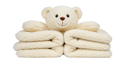 BABY TOYS - Soft beige teddy bear sitting on neatly folded beige towels, cozy fabric texture, perfect for baby care and nursery decor