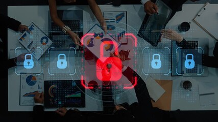 Aerial view of business professionals collaborating on financial analysis with a digital lock symbol overlay, representing data security and protection in the workspace. Raster - Powered by Adobe
