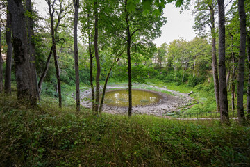 Obraz premium Kaali meteorite crater on the Estonian island of Saaremaa in the Baltic Sea